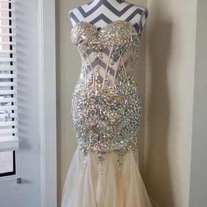 Nude extremely beaded corset style mermaid gown.